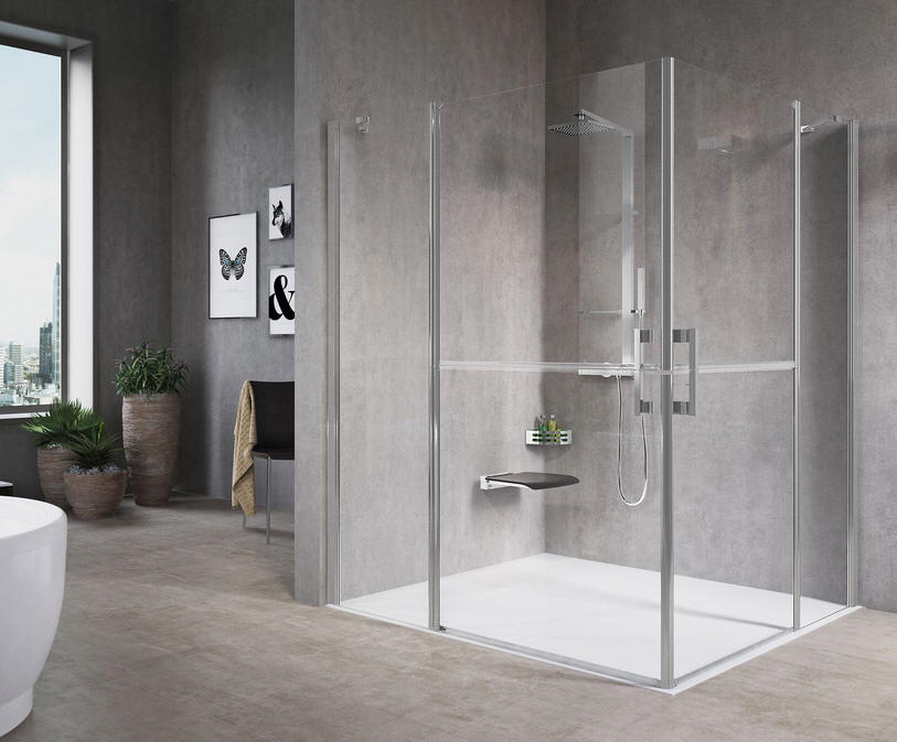 Extra large corner shower enclosure with stable style split shower doors for carer assistance. Ideal for wheelchair use.
