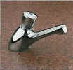Self closing push button basin tap with flow regulator