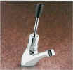 Self closing lever operated basin tap with flow regulator