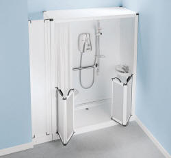 Shower toilet cubicle showing typical installation to an alcove. Note the side panel that conceals the toilet support frame, soil pipe and cistern