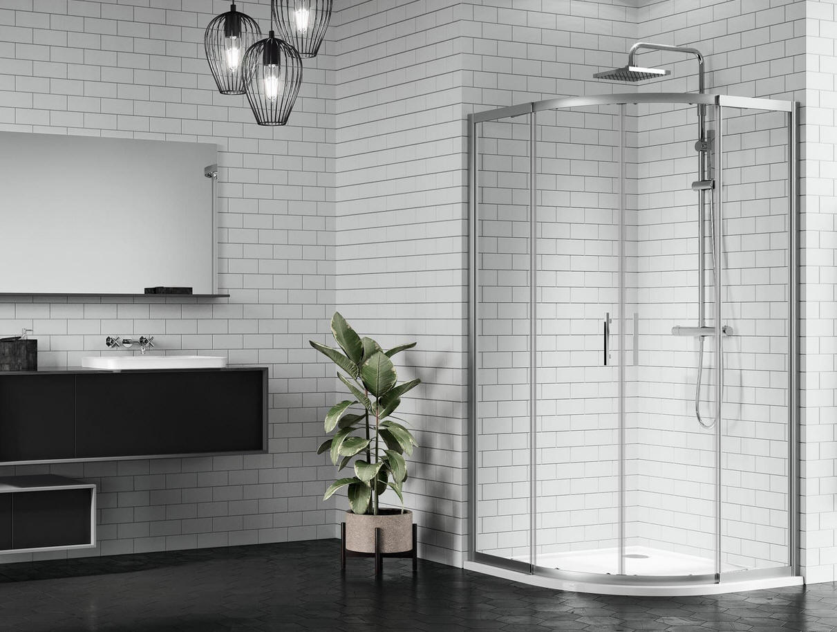 Novellini ZEPHYROS R quadrant shower enclosure comprising double sliding curved glass doors.