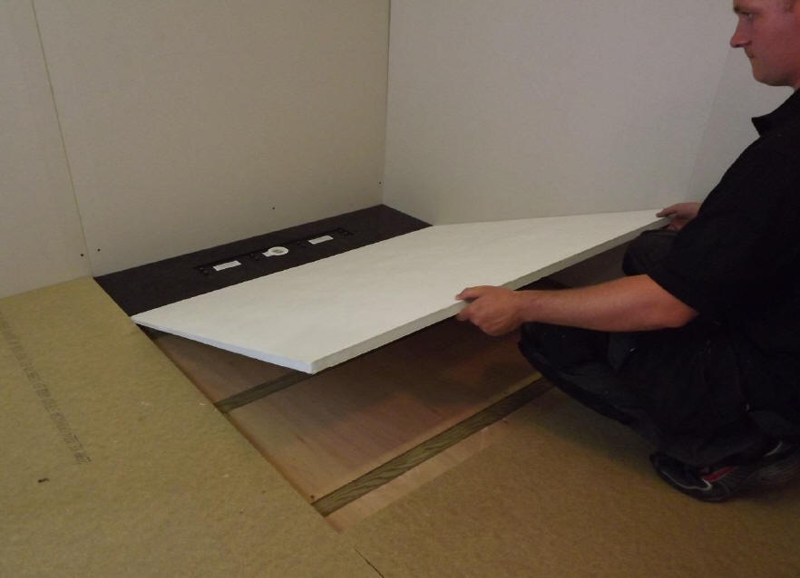 Lay the trimmed tapered board in place ensuring a snug fit.