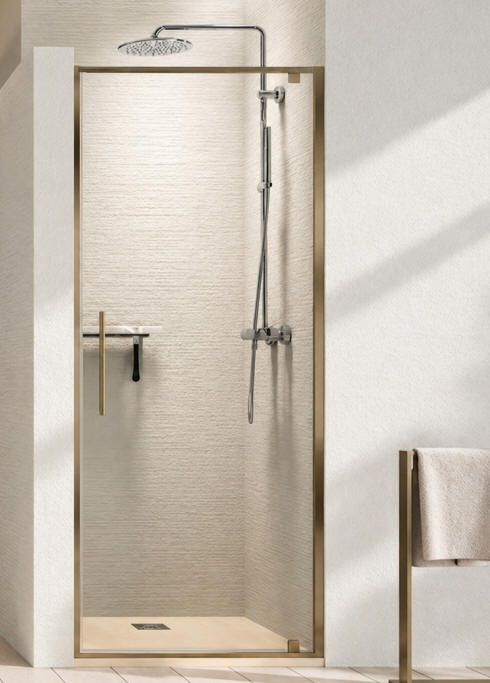 Novellini RIGA G pivot shower door in an alcove setting - Bronze finish