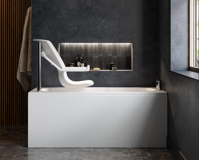 Mantaleda OMEGA care bath. Side view of powered lift and traverse seat raised